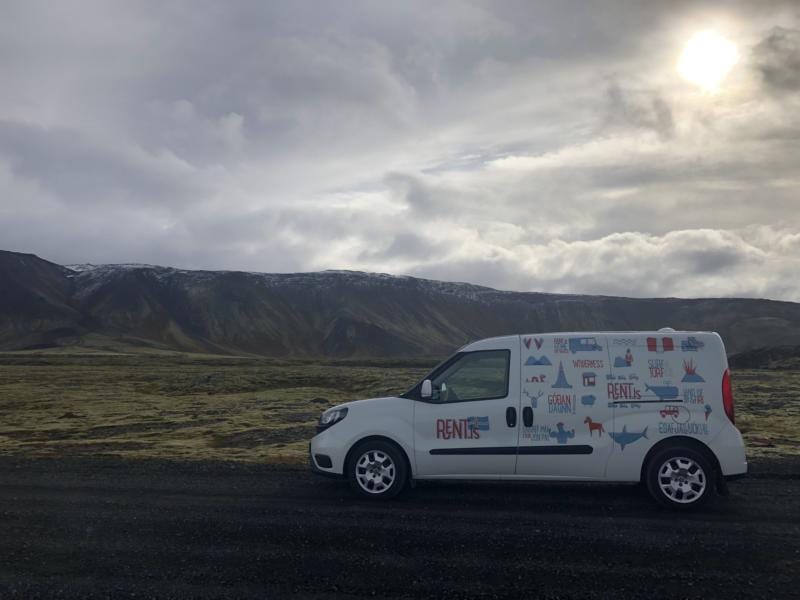newrent.vinnugrunnur.is campervan drving , mountains, gravel road, traveling in Iceland