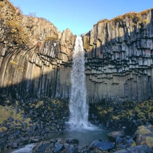 October by Svartifoss waterfall October by Svartifoss waterfall