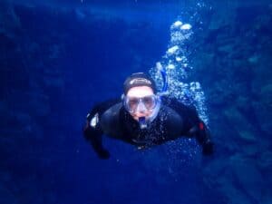 Snorkeling between the tectonic plates in Silfra Snorkeling between the tectonic plates in Silfra
